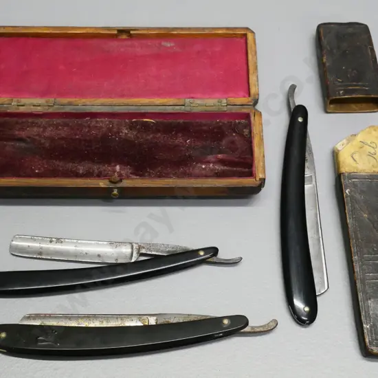 3 straight razors - one with slip-case, 2 in restorer's wooden box, all have corrosion / wear
