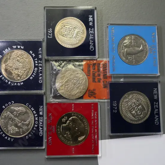 7 New Zealand commemorative collector coins - 1969 Bicentenary, 1983 Royal visit, 1988 penguin, etc.