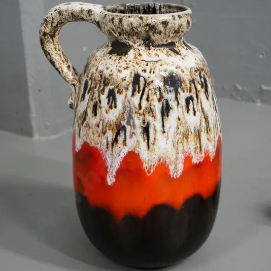 German pottery orange and brown trickle glaze single handled vase H-260