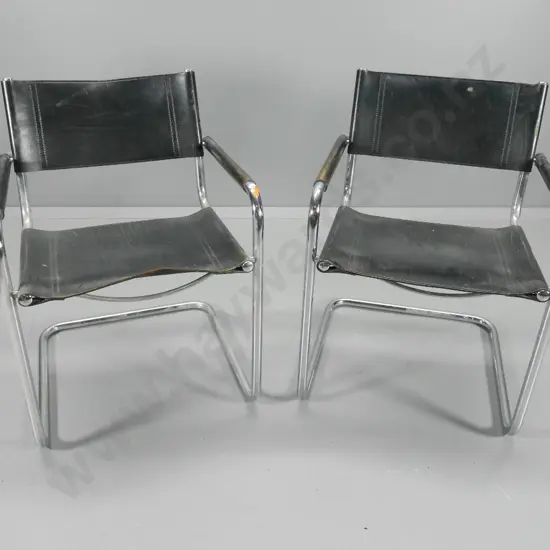 pair of Bauhaus style chrome tubular frame chairs w/black leather seat & back - wear to leather H770 W560 D520