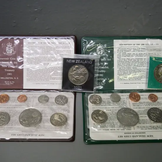 Cased New Zealand coin sets - 1980 and 1981 - souvenir sets with dollar and individual dollars