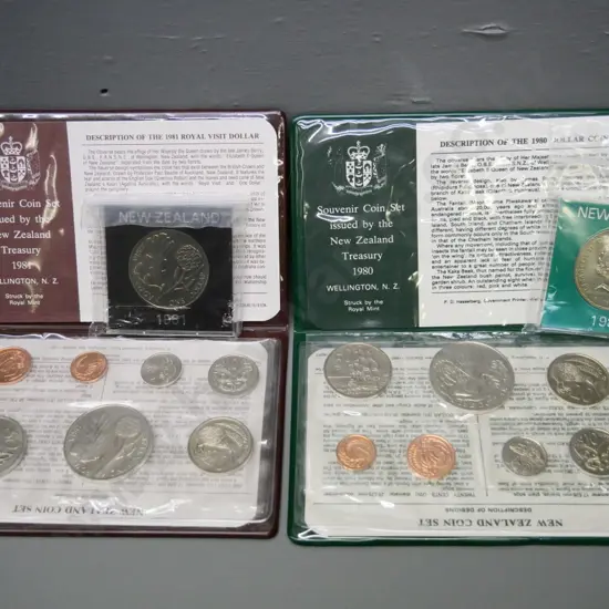 Cased New Zealand coin sets - 1980 and 1981 - souvenir sets with dollar and individual dollars