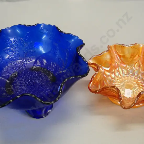 2 carnival glass bowls - small orange and a cobalt blue 3-footed bowl with stag at bay motif H-90 Diameter 200