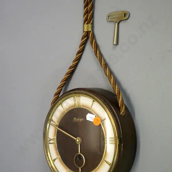 Keininger German wall clock with rope hanger and key. Diameter 190