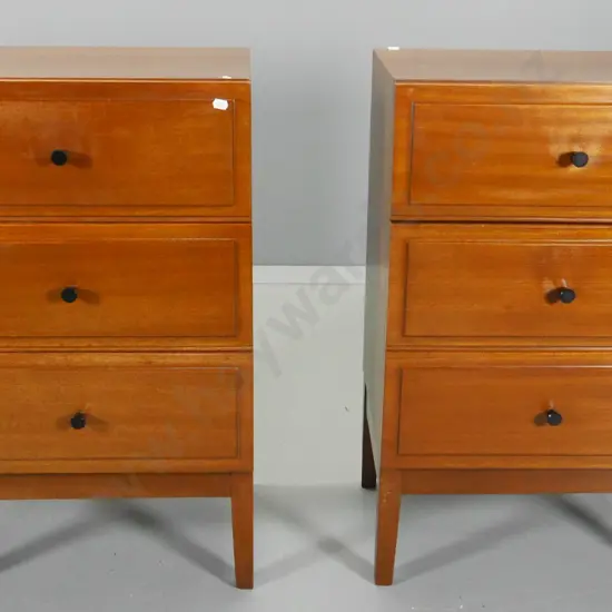 pair of mahogany mid-century 3-drawer bedside cabinets with plastic handles, minor split to top of one H740 W460 D350