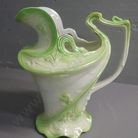 green lustre wash jug -some wear, crazing and hairline crack H-340