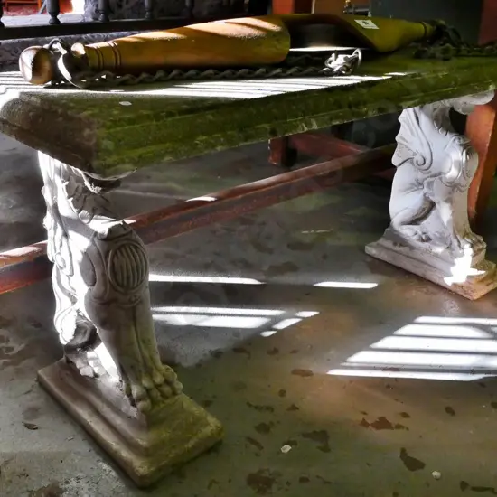 concrete garden bench seat with animal theme stands H-450 W-1060 D-380 -chip to one of the stands-