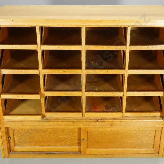 large oak office/shop storage cabinet w/16 open-front inner drawers, missing sliding doors, top cracked H1090 W1300 D640