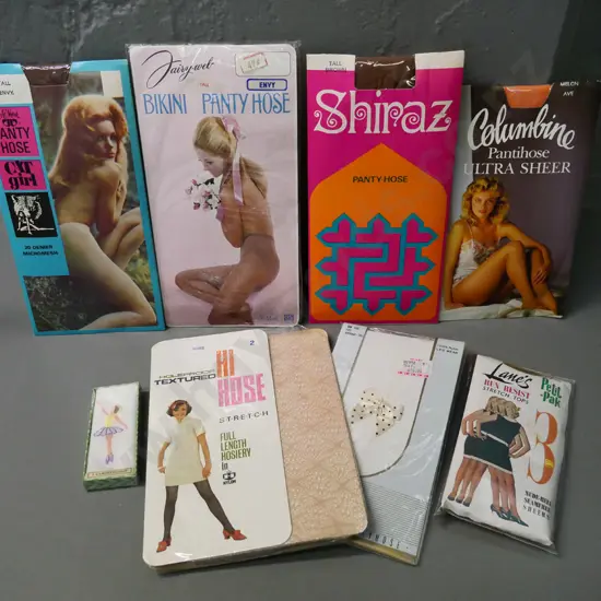 7 pairs vintage pantie hose in original packaging and one boxed handkerchief