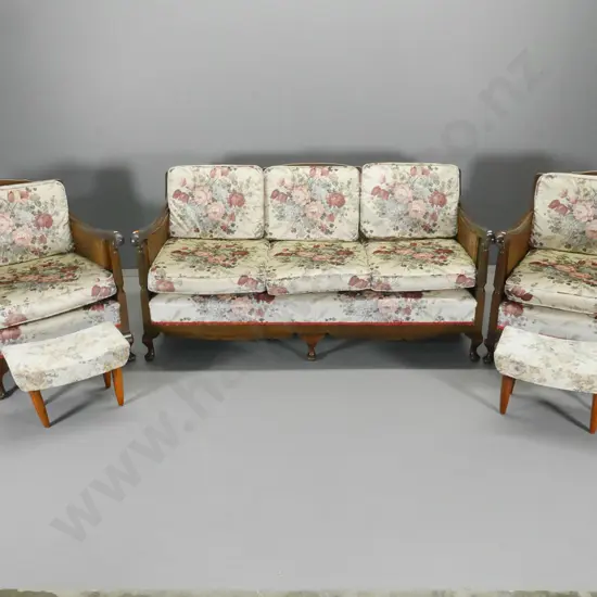 mahogany bergere floral print lounge suite: 3-seater settee, 2 armchairs and 2 non matching foot-stools H810 W1610 D830
