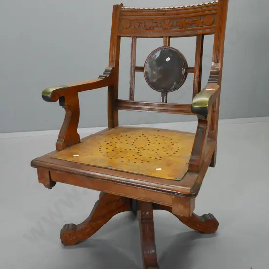 vintage carved oak office chair with carved top rail, brass caps on arms H910 W560 D520