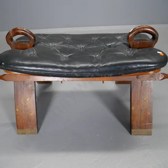 camel stool with studded leather cushion - scuffs and has had repair to one handle H-410 L-740 W-370