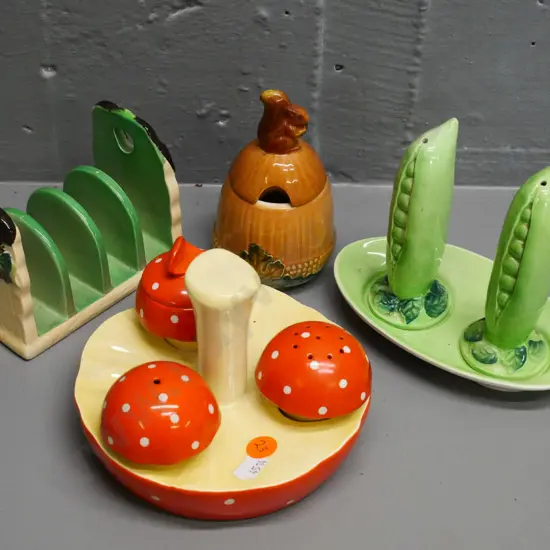 various Carlton Ware items: pea pod salt & pepper, mushroom condiment set,  jam pot & grape pattern toast rack,