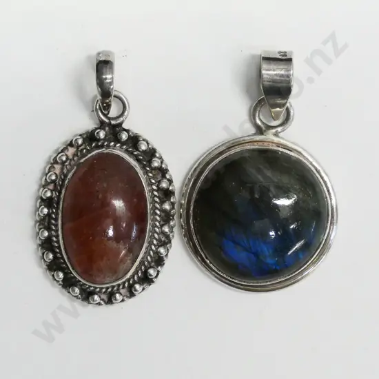 2 stone & silver pendants no markings or chain