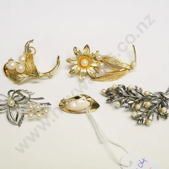 5 costume brooches