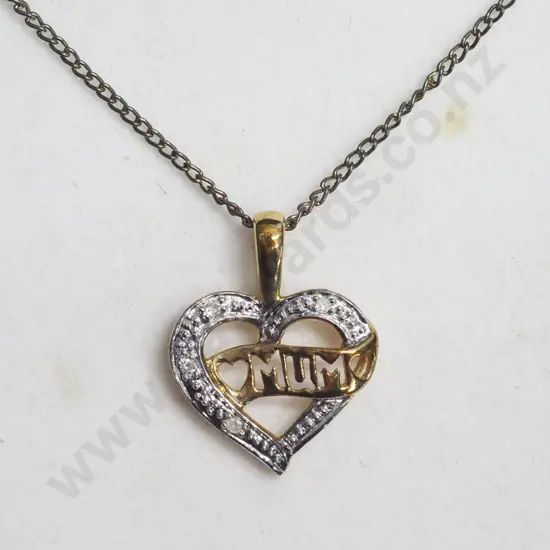 heart shaped necklace with diamantes and the word mum