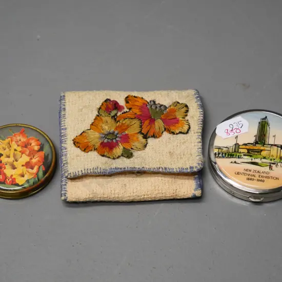 2 powder compacts NZ centennial exhibition 1840-1940[mirror cracked] & smaller 1 with gladiolis