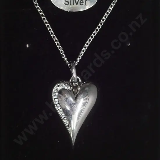 silver heart shaped pendant with cz stamped 925