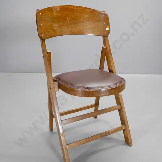 vintage mixed timber folding chair with studded leatherette seat - wear to finish H-860 W-470 D-410