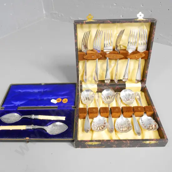 2 sets of cased cutlery