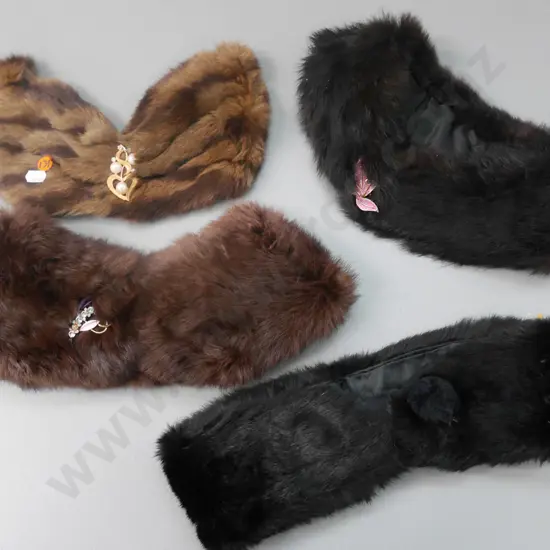 fur collars and bow with costume jewellery brooches