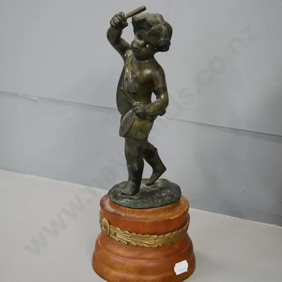 cast metal drummer boy on turned wood base with ormolu decoration H-270