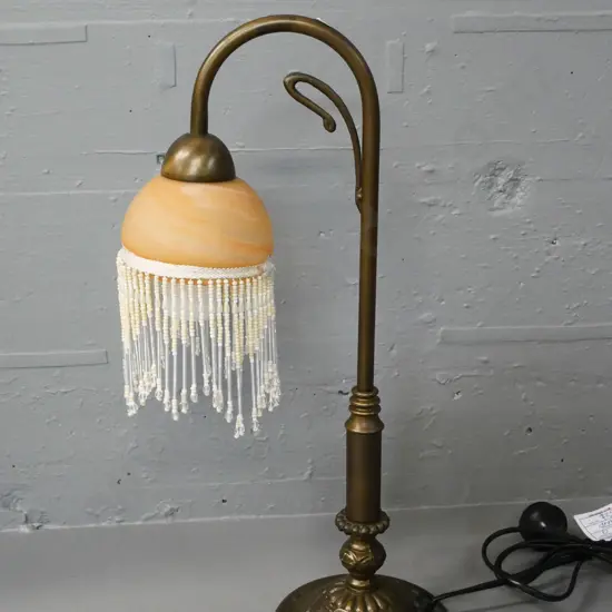 reproduction deco style cast metal swan neck table lamp with beaded fringe on shade H-460