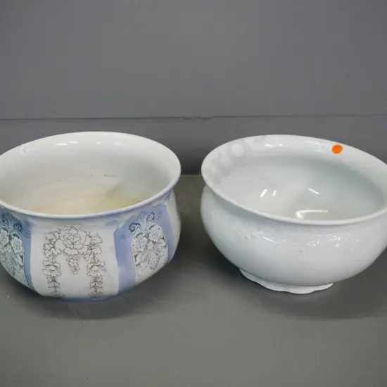 2 chamberpots - one relief pattern Alfred Meakin, one floral F & Sons (some discolouration)