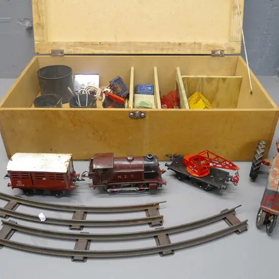 homemade mdf toy box with Mecanno, Hornby clockwork train, toy tractor