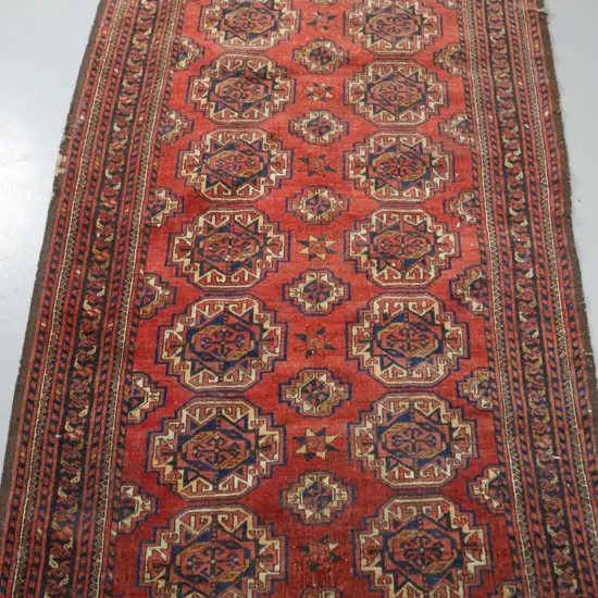 hand-woven Turkish Baluchi region wool floor rug, circa 1920s, significant wear L1800 W1060