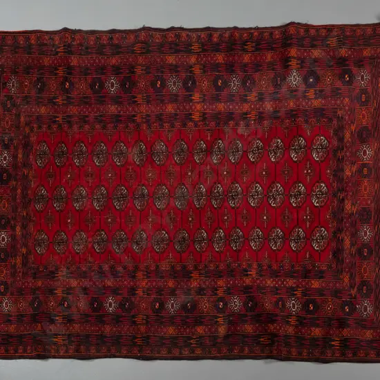 hand-knotted wool floor rug - red, orange and black,- some fraying to edges L-1610 W-1270