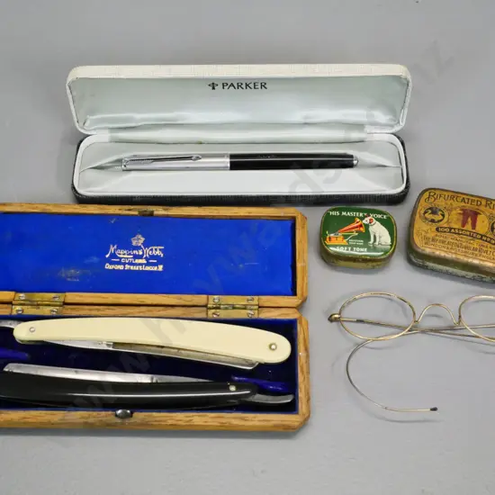 two straight razors in fitted wooden case, vintage spectacle frames, Parker fountain pen, gramophone needles in tin etc.