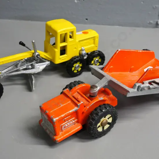 2 Fun Ho road work vehicles - early 1980s road scraper and newer grader, each approx L-280