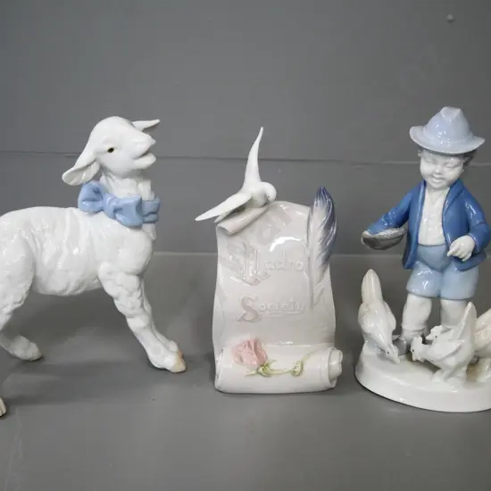 Lladro lamb H-190, Lladro Society plaque, and a German figure - boy feeding chickens