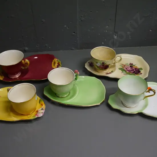 5 china tennis sets - 4 Royal Winton and 1 Royal Albert