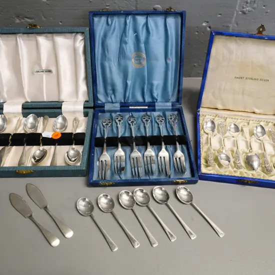 sterling silver cutlery - 3 cased sets, 2 butter knives and 6 coffee spoons