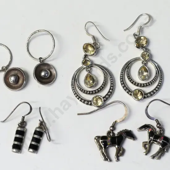 4 pairs of silver earrings stamped sterling