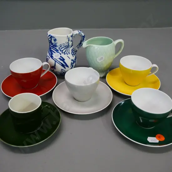 5 demi-tasse cups & saucers - 4 German, one French, and 2 jugs - English and blue & white w/ no mark