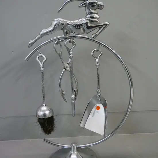chrome fireside set with leaping gazelle figure - some pitting, brush poor condition, gazelle a bit loose H-540
