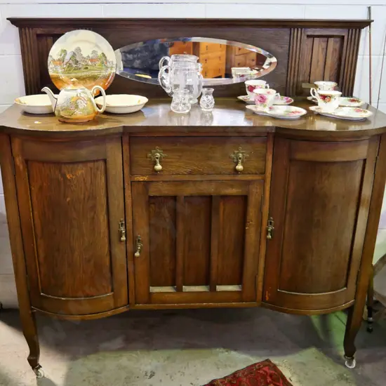 deco oak 3-door single drawer sideboard w/brass drop handles, oval bevelled mirror in upstand, keys H1350 W1370 D560