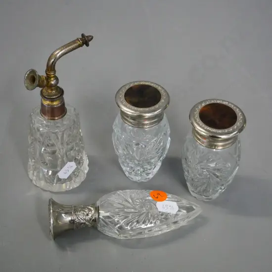 4 depression glass perfume bottles, one with atomiser, others with bakelite & silver plated caps