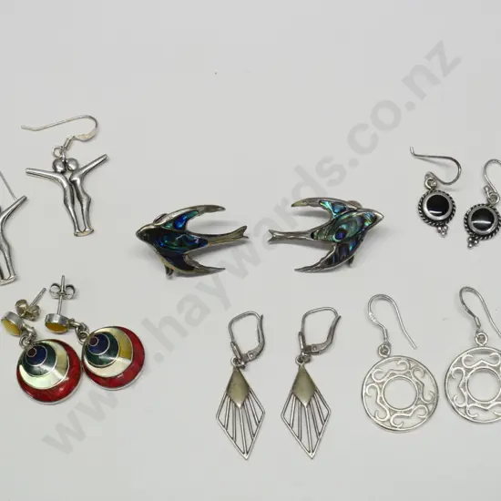 6 pairs of silver earrings all stamped