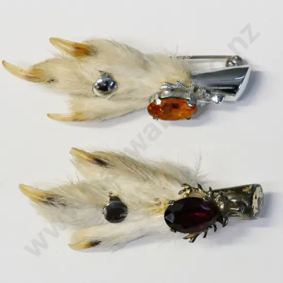 2 claw foot brooches