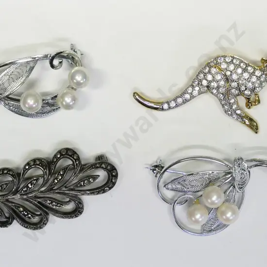 4 costume brooches
