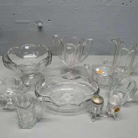 9 pieces of clear heavy depression glass - vase H-210, 3 jugs, 2 sugars, footed bowl etc.