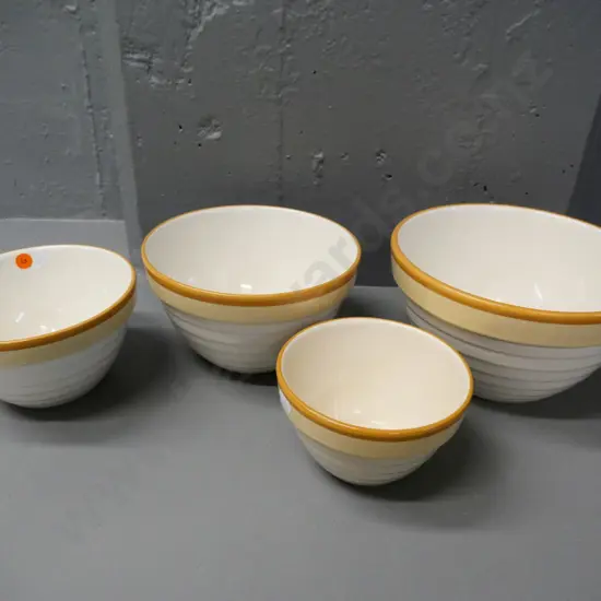 set of 4 NZ (Crown Lynn?) graduated mixing bowls - 2 have some interior glaze wear - largest is D-220