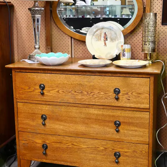 deco oak mirror-back dresser w/oval bevelled mirror, 3 drawers w/teardrop handles, top rail removed H1410 W990 D470