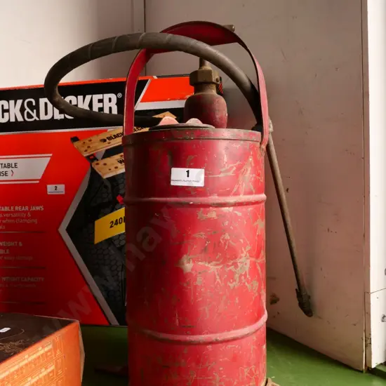 vintage fire extinguisher with stirrup pump