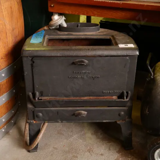 cast iron Champion Hotdogge Junior hut stove converted to lpg burner