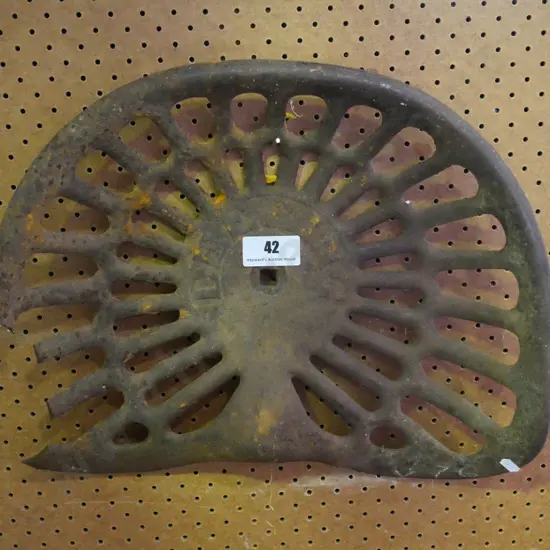 vintage Deering tractor seat - some damage